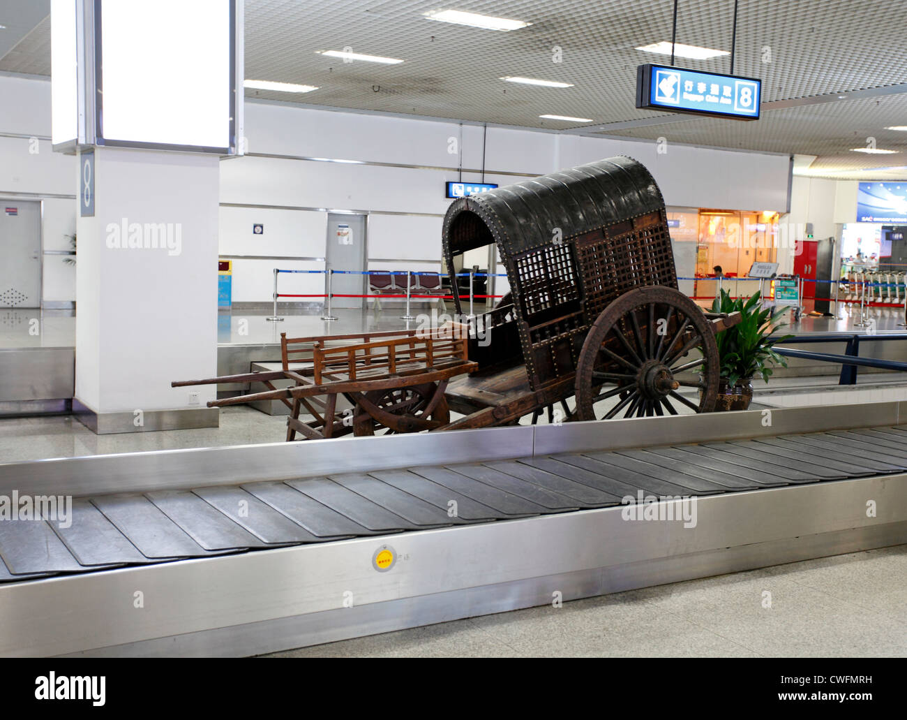 Chinese cart on display in an airport baggage reclaim Stock Photo Alamy