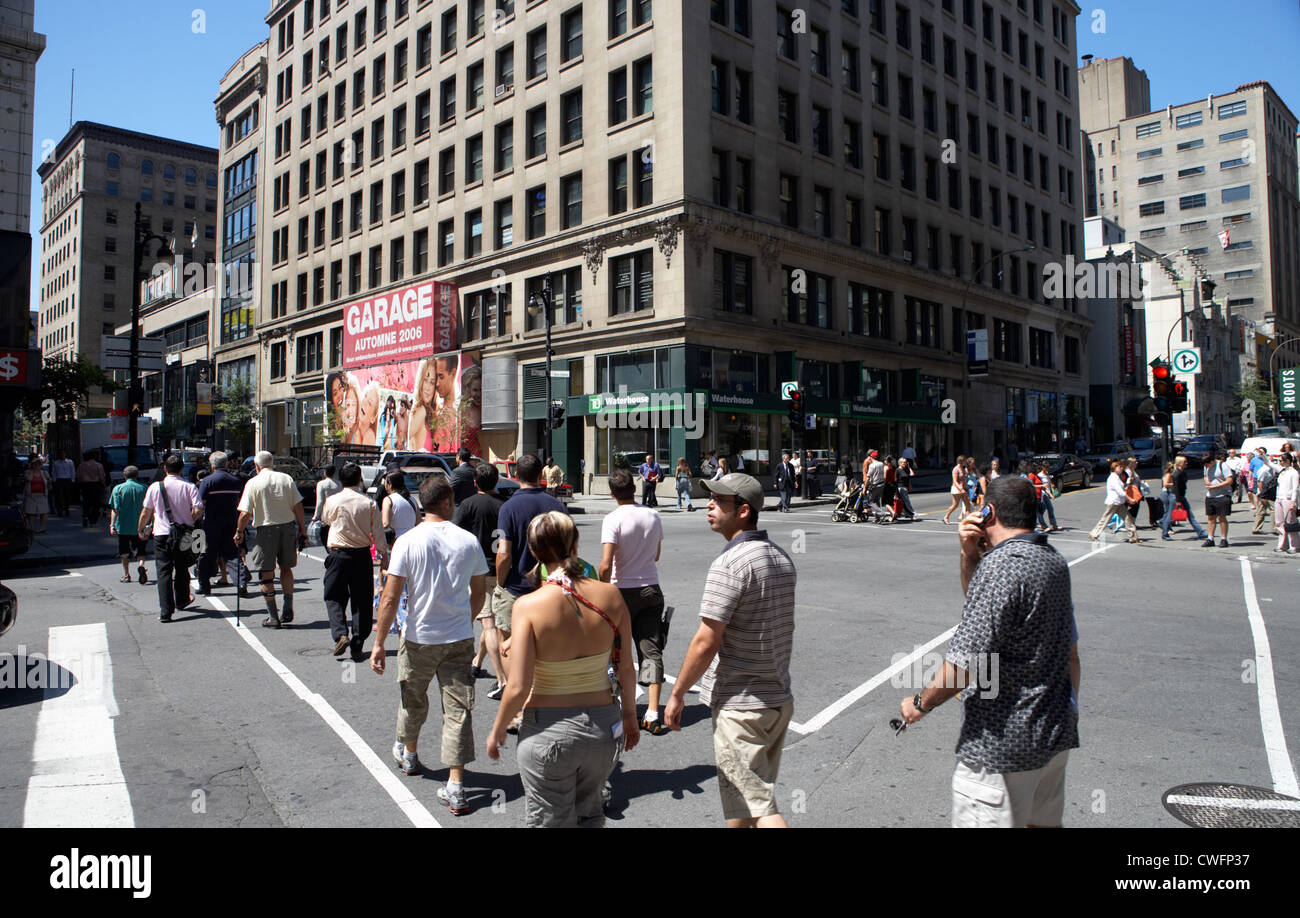 Montreal - pedestrians at an intersection in downtown Stock Photo
