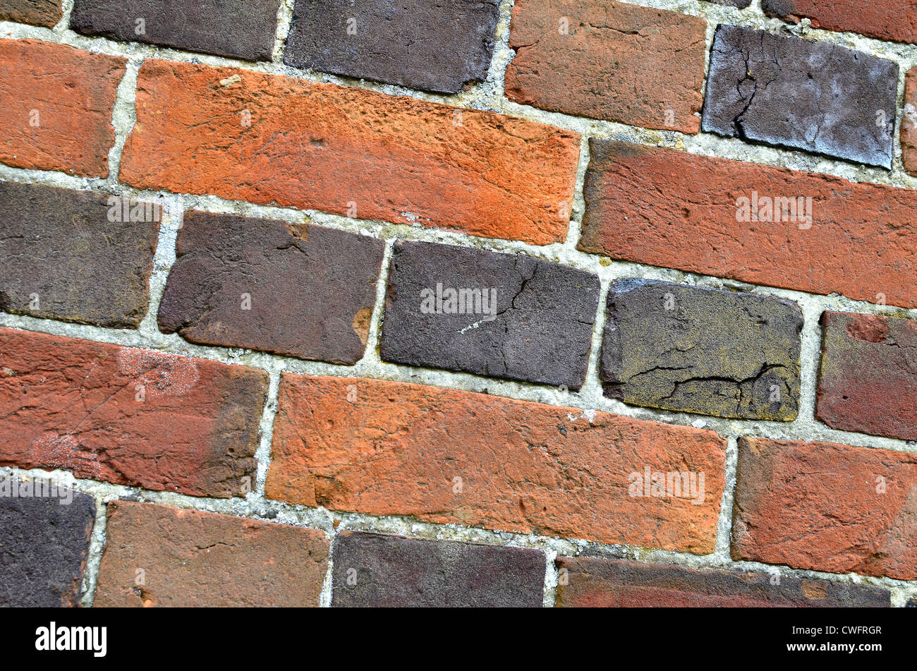 Denial of access, computer security / firewall concept. Rural old brick wall with locally fired brickwork. Stock Photo