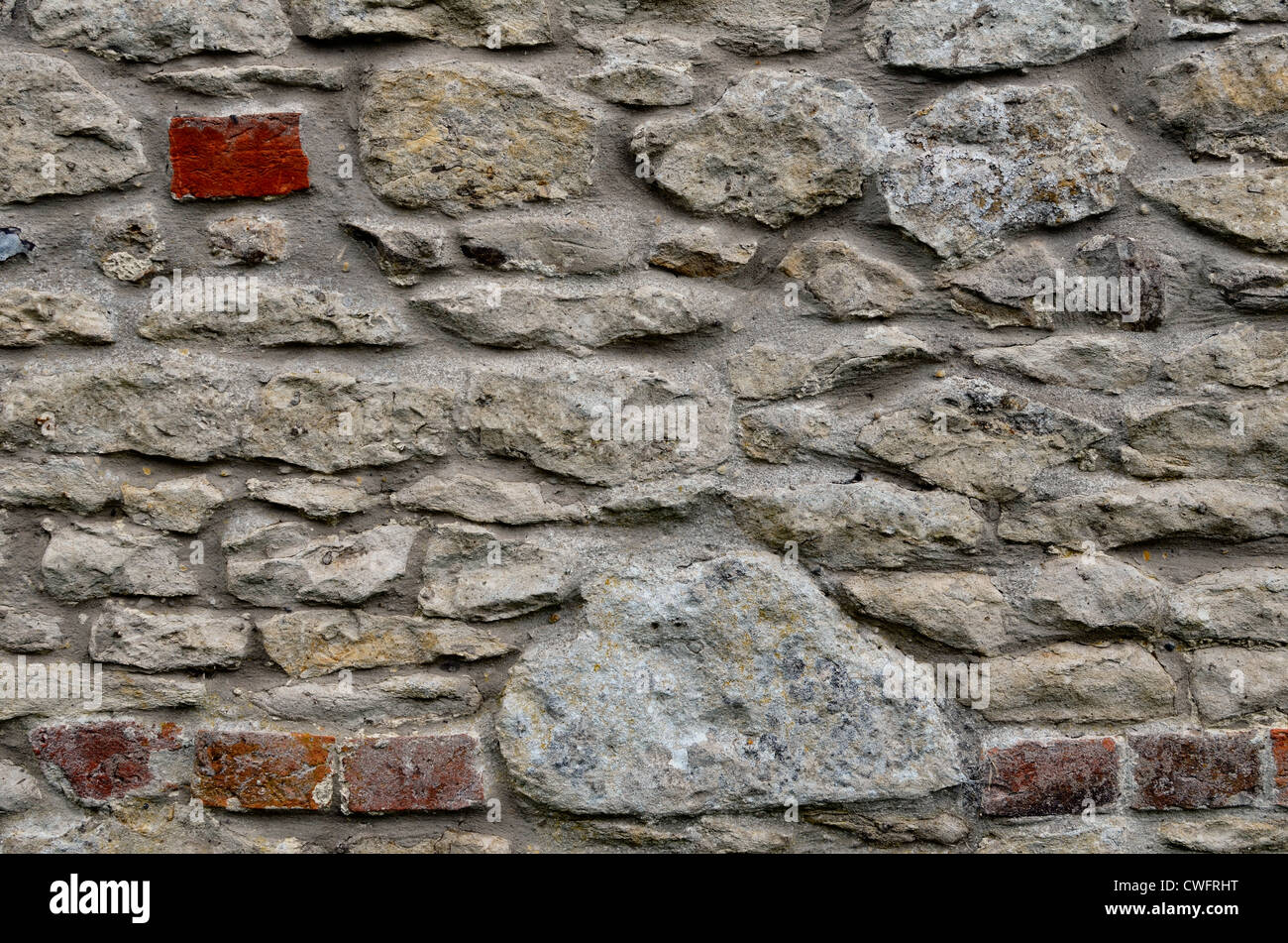 Denial of access, computer security / firewall concept. Stone building wall / detail of weathered stonework - western Wiltshire Stock Photo