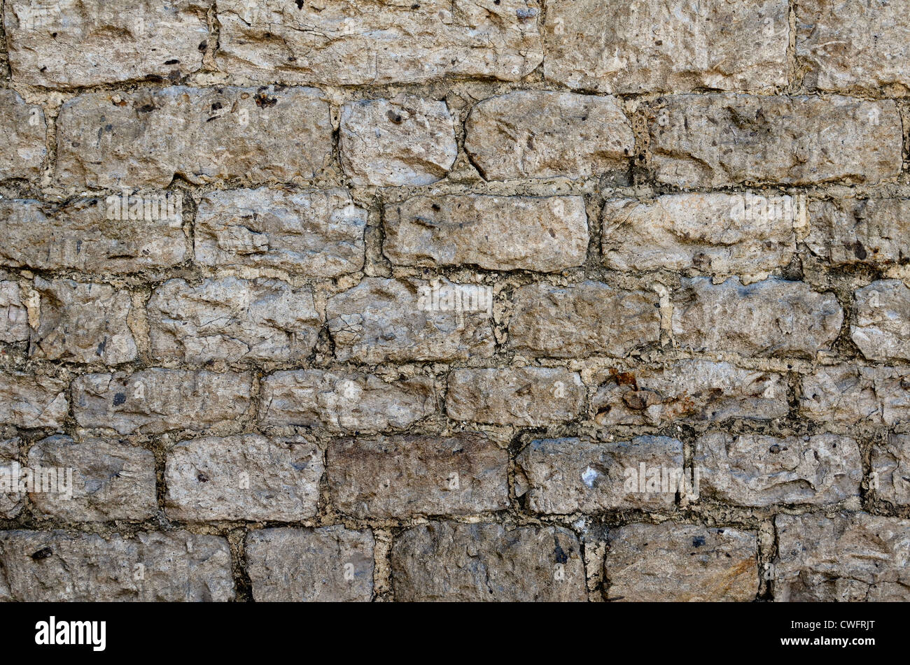 Denial of access, computer security. Stone building wall / detail of weathered stonework with lime mortar  - western Wiltshire Stock Photo