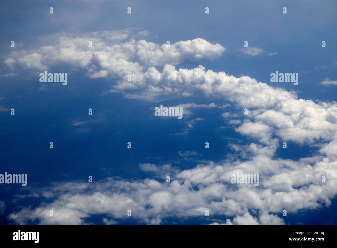 View from aeroplane window of Cumulus clouds Stock Photo - Alamy