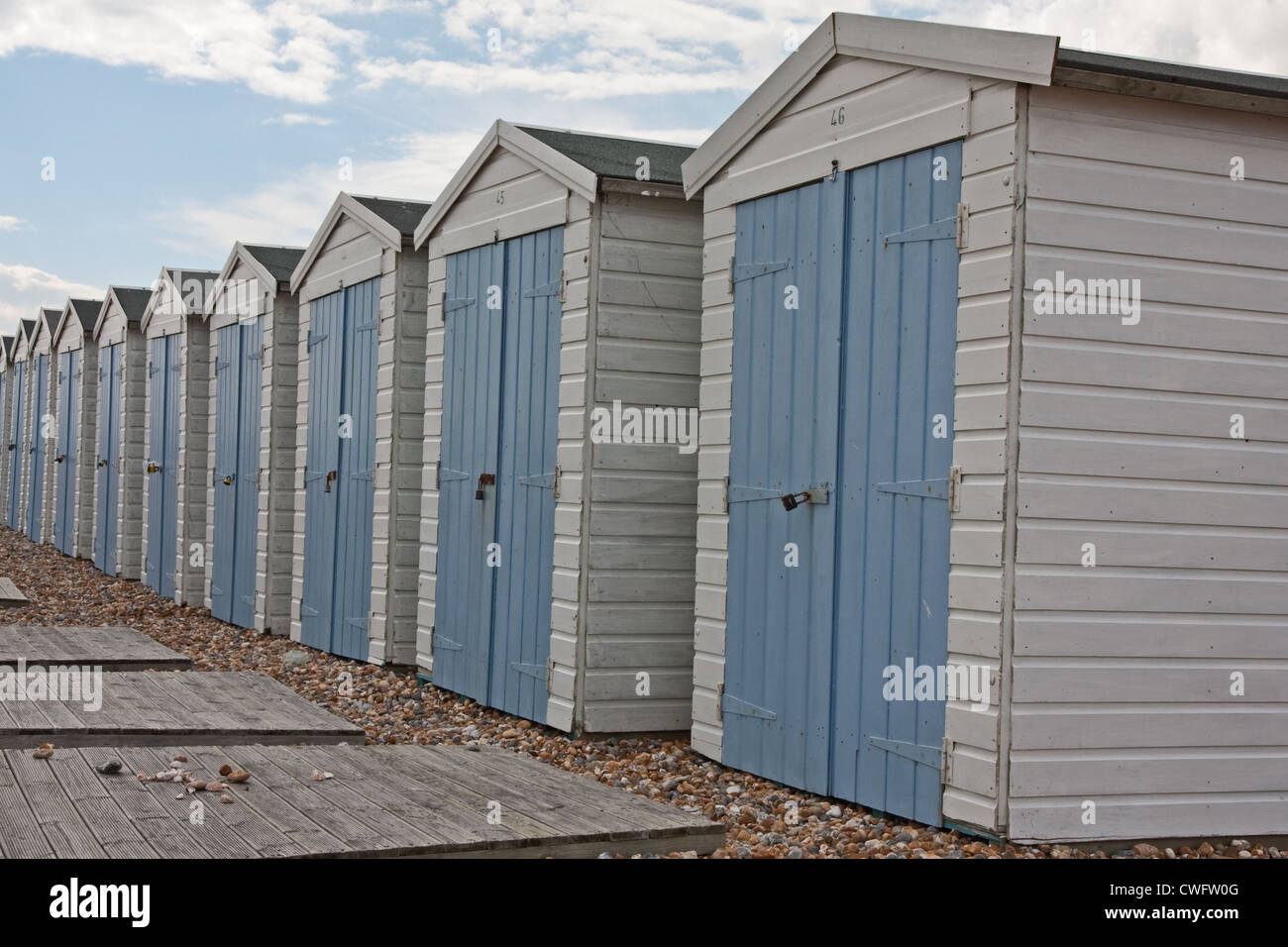 Beach huts on beach, Bexhill Stock Photo Alamy
