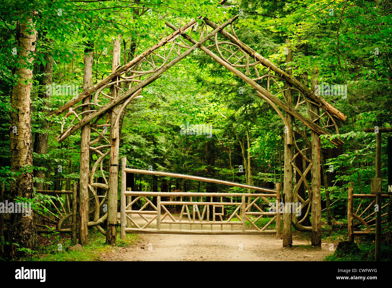 Rustic gate marks beginning of Adirondack Mountain Reserve in High Peaks region New York State Stock Photo