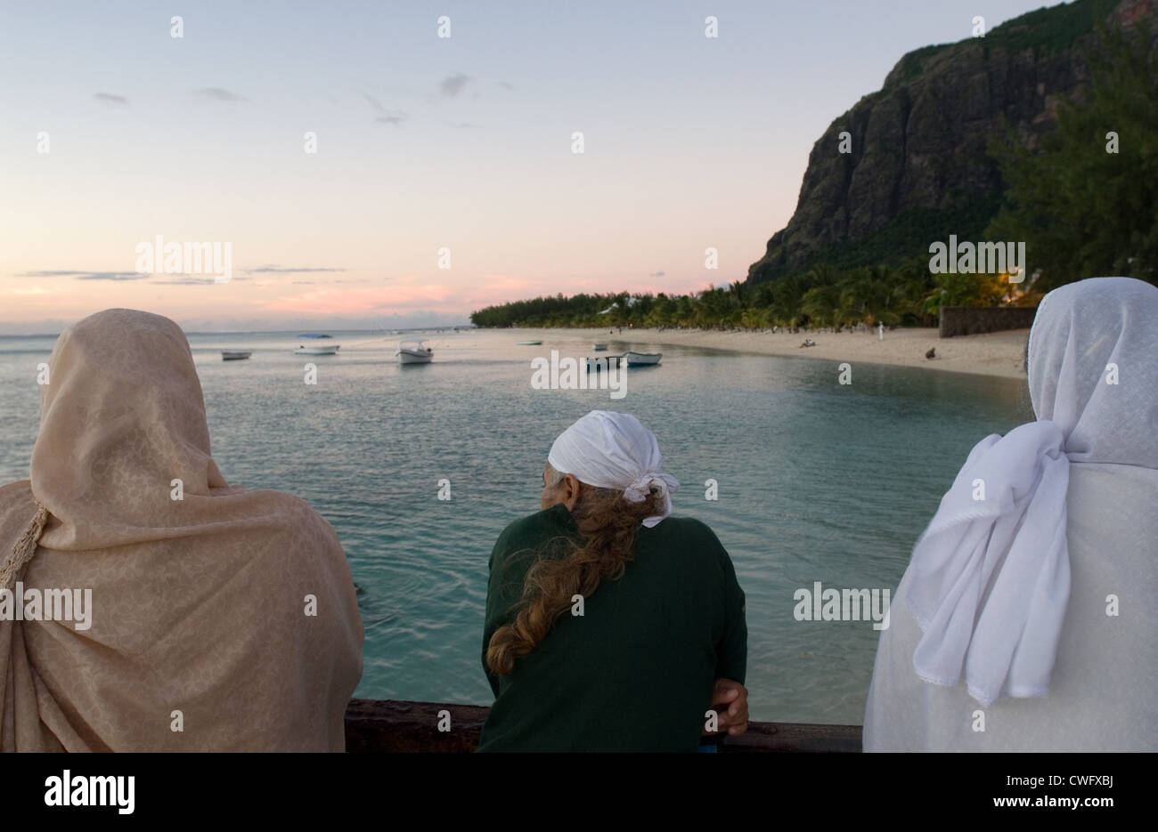 Women on the beach of La Morne Brabant (Mauritius) Stock Photo