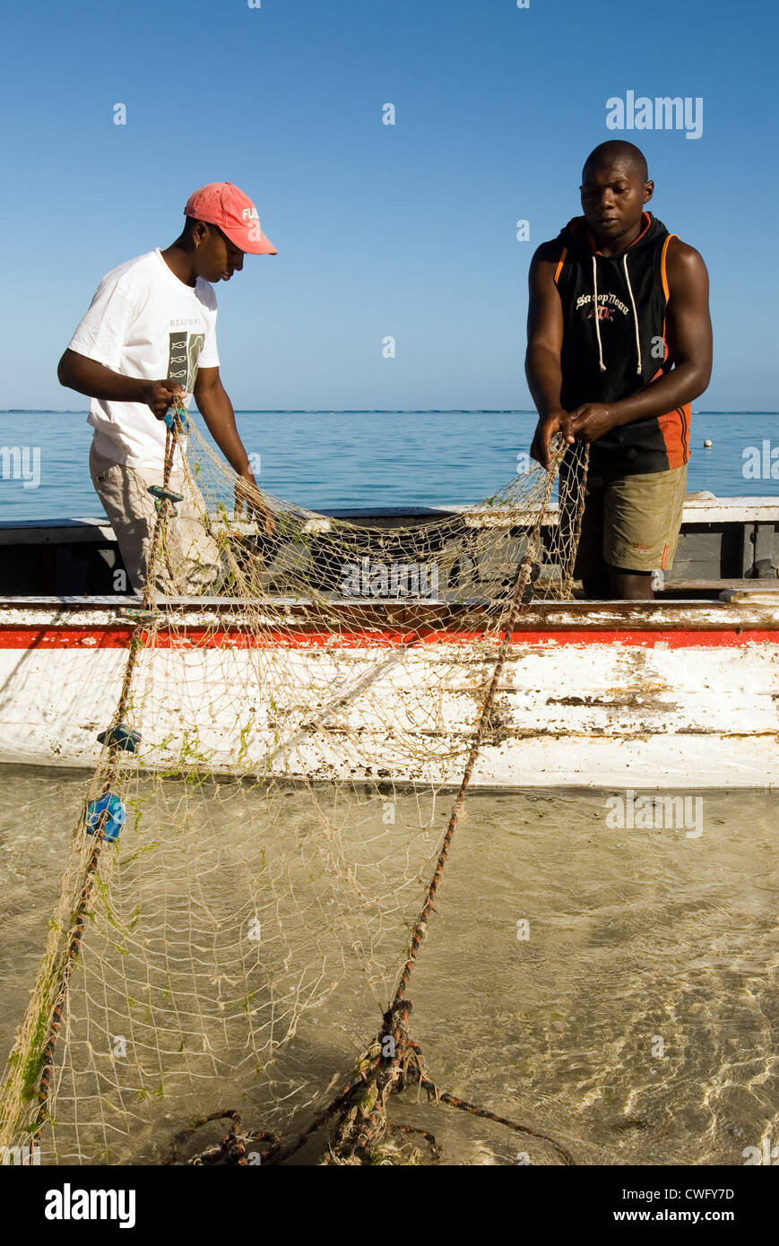 Fishermen in the Bay of La Morne Brabant (Mauritius) Stock Photo