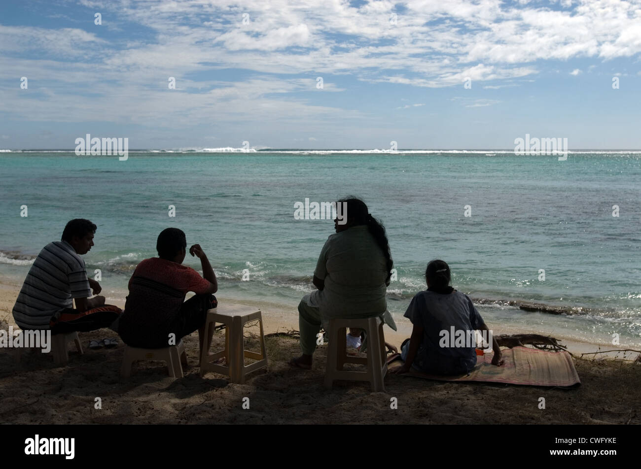 People on the beach of La Morne Brabant (Mauritius) Stock Photo