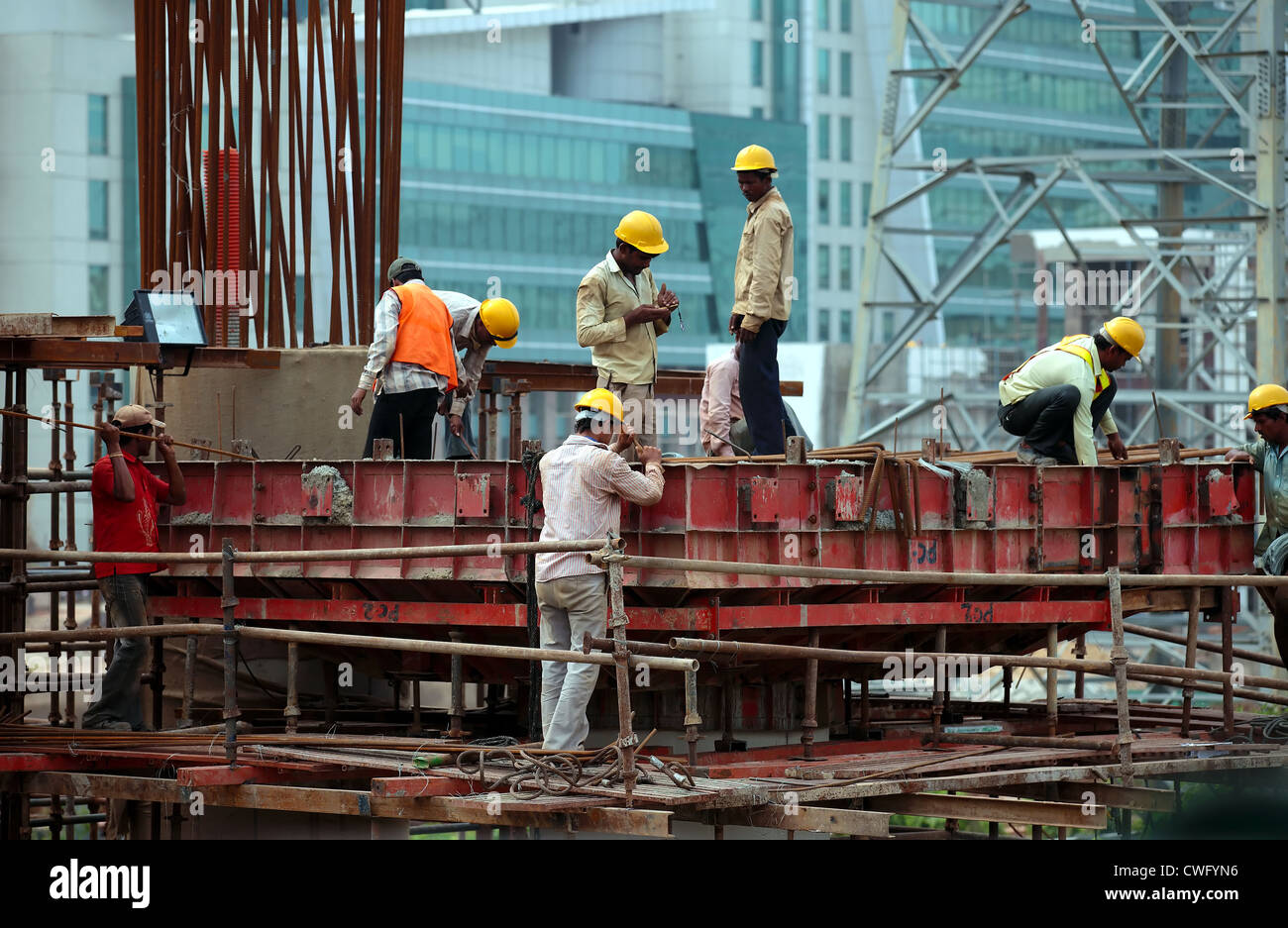 Workers at a construction site Stock Photo - Alamy