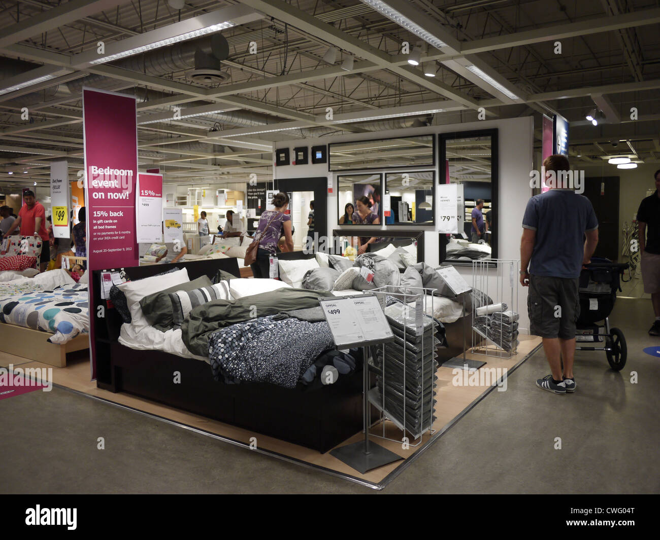 bedroom furniture shopping customers showroom ikea Stock Photo - Alamy