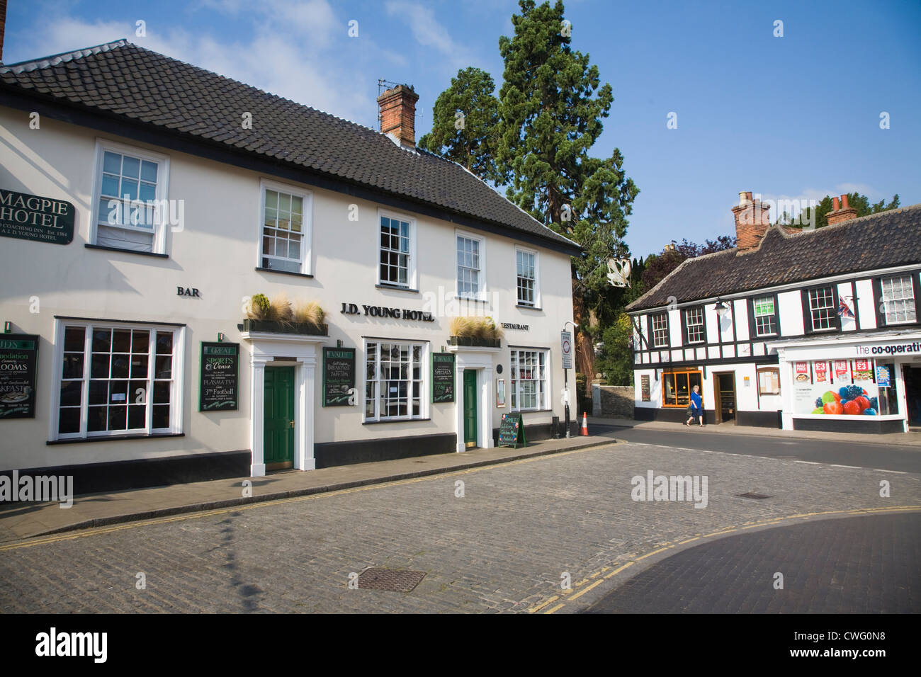 Magpie hotel and shops in the market square Harleston Norfolk England Stock Photo