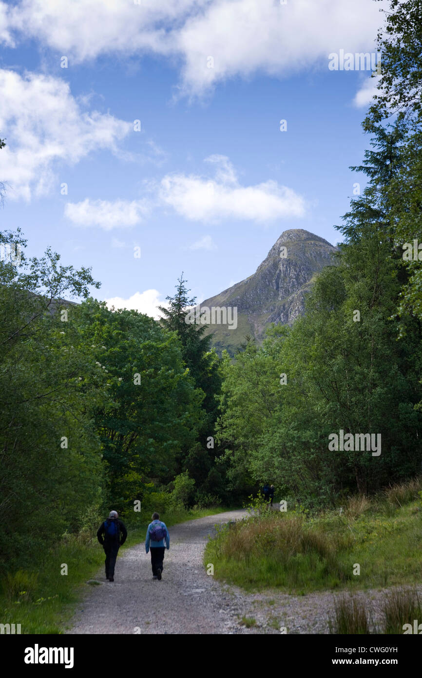 Two hill walkers heading towards Sgorr Dhonuill, Ballachulish, Scotland. Stock Photo