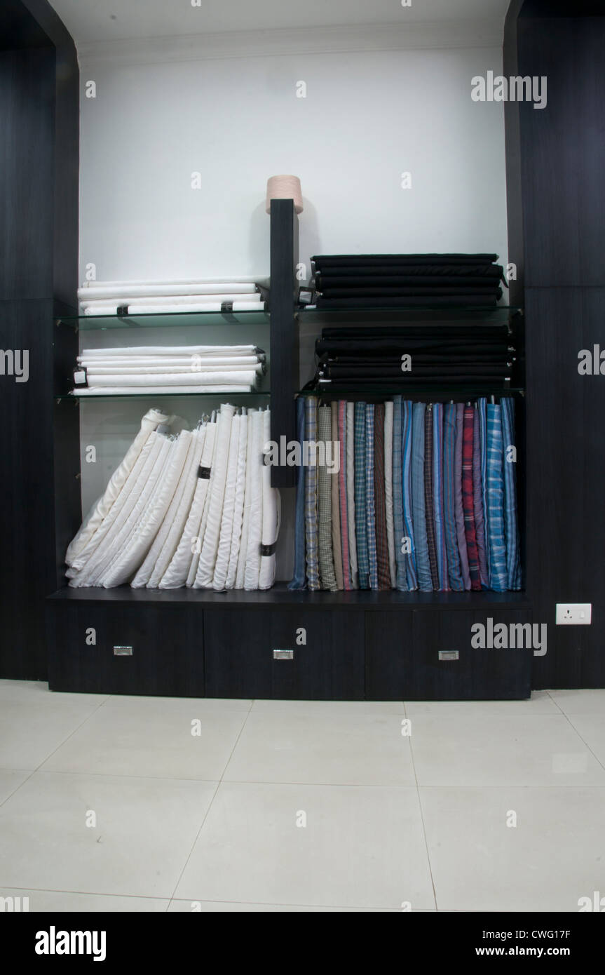 Linen cotton fabric clothes display on shelfs in shop Stock Photo Alamy