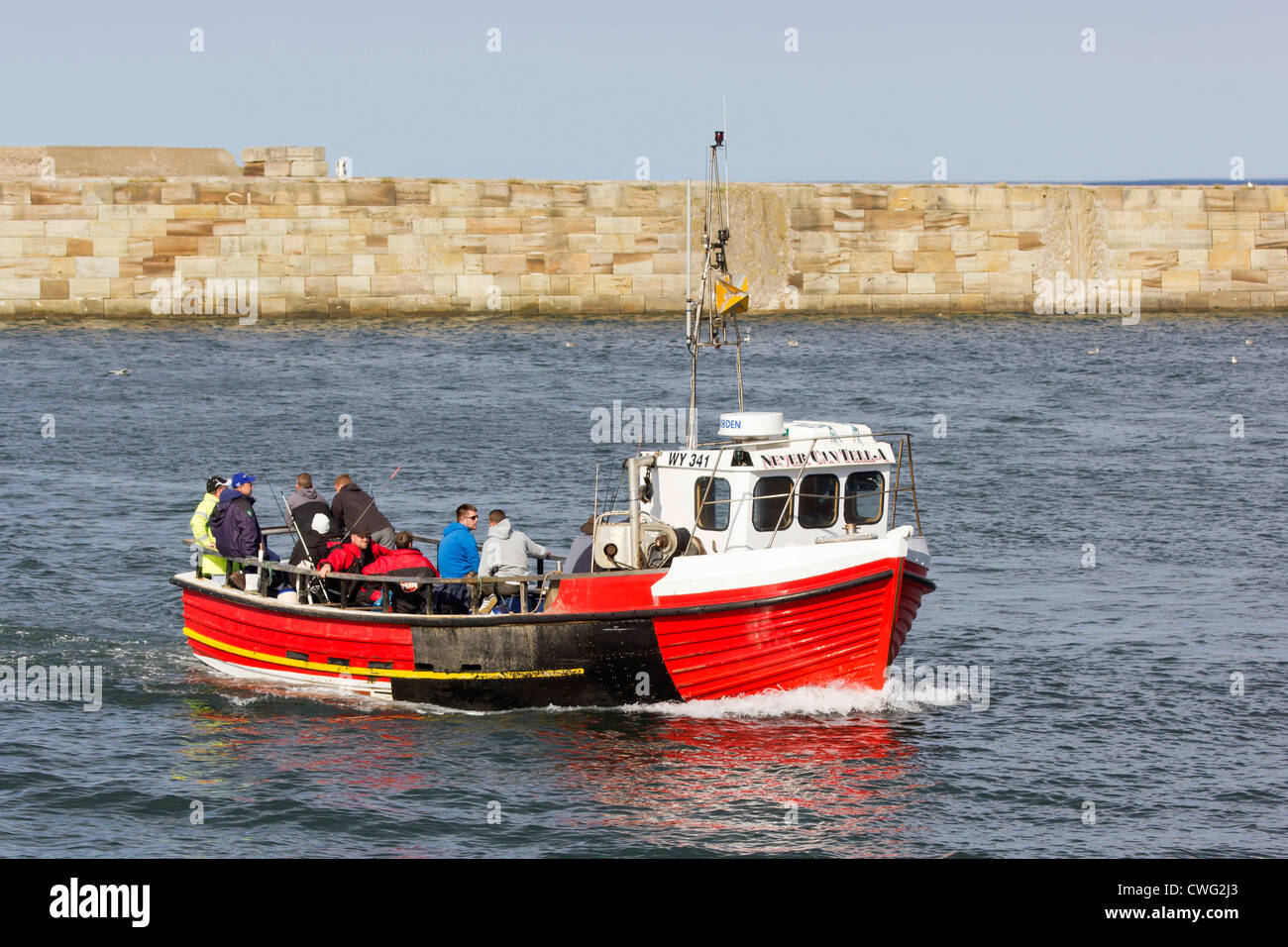 Whitby - north Yorkshire during the Regatta a fishing boat entering the ...