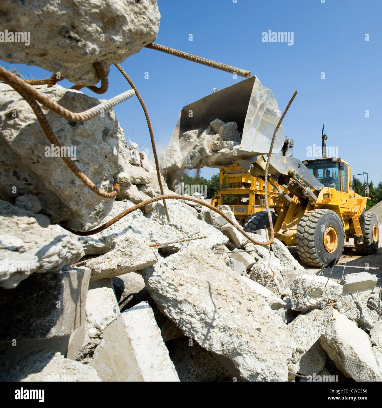 Krauchenwies, a wheel loader with a heaping pile rubble Stock Photo