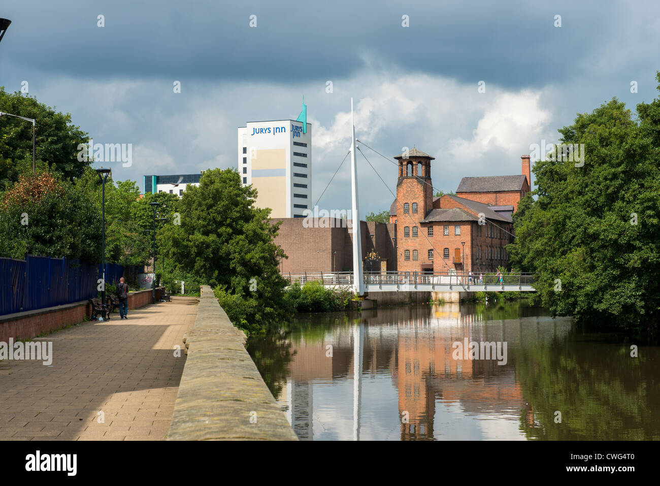 Riverside path in Derby with the Silk Mill  Industrial Museum and Jurys Inn in the background Stock Photo