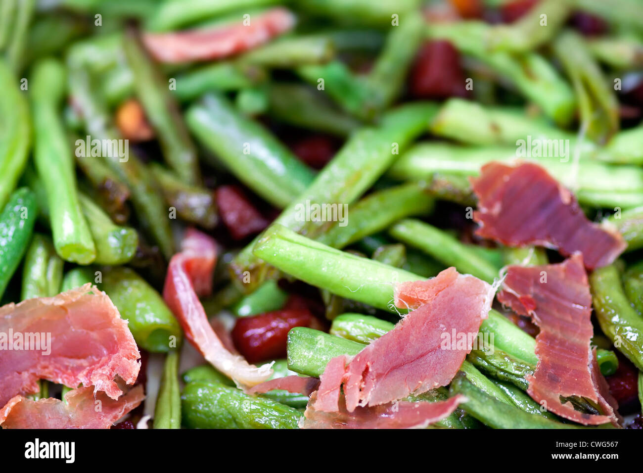 Salad - fried green beans with Serrano ham - Spanish cuisine Stock Photo