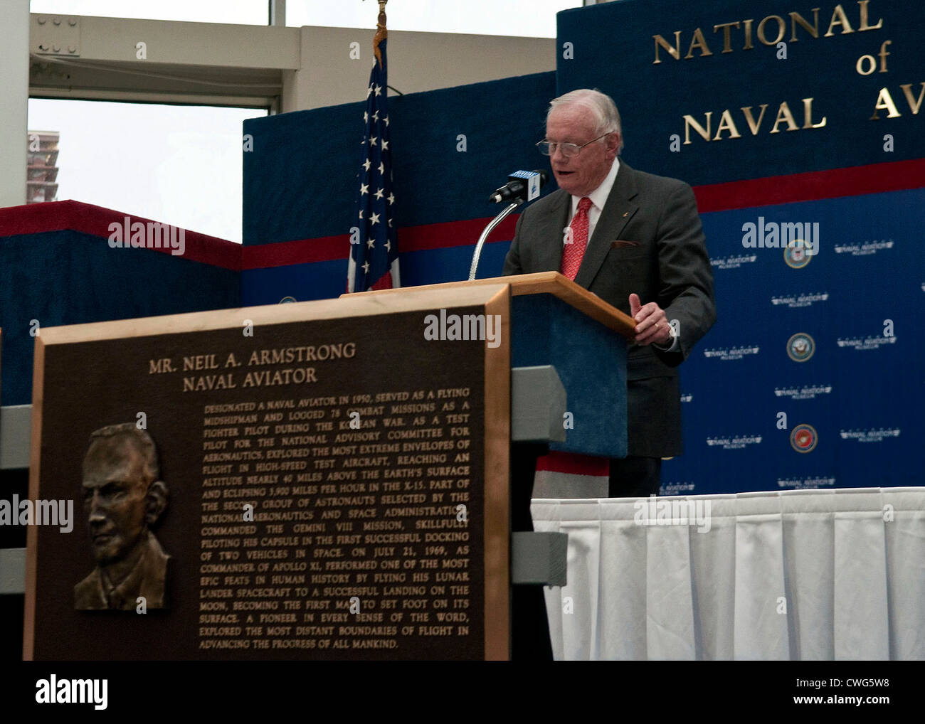 Former astronaut Neil Armstrong gives an acceptance speech after being inducted into the Naval Aviation Hall of Honor at the National Naval Aviation Museum in Pensacola, Fla. The Naval Aviation Hall of Honor was founded in 1979 to recognize individuals who have made extraordinary contributions to Naval Aviation. Armstrong was inducted with retired Vice Adm. William P. Lawrence, retired Marine Corps Lt. Gen. Thomas H. Miller and retired Navy Capt. Richard P. Bordone. Stock Photo