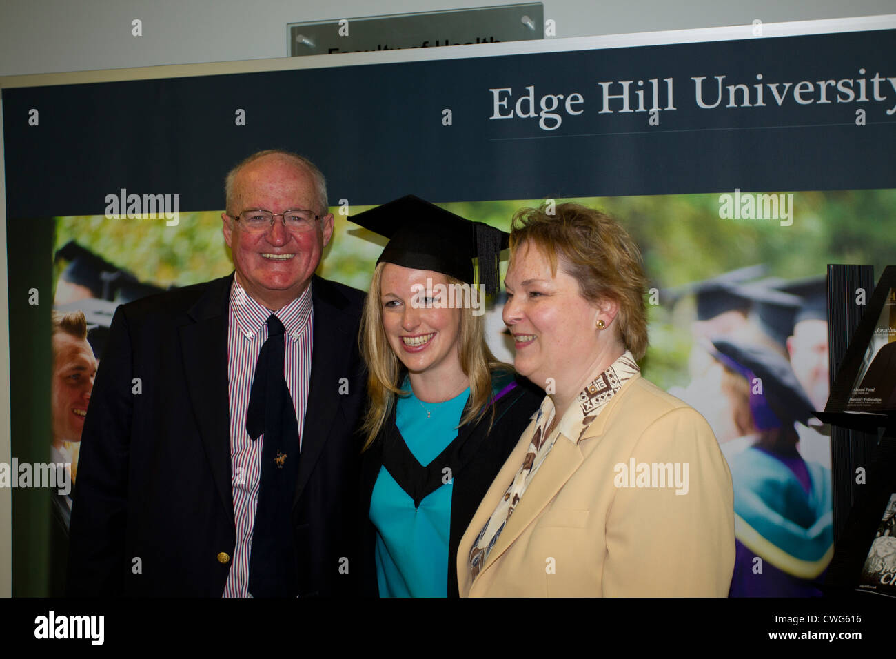 Edge Hill University  Ormskirk, proud parents  mother and father and daughter on graduation day Stock Photo