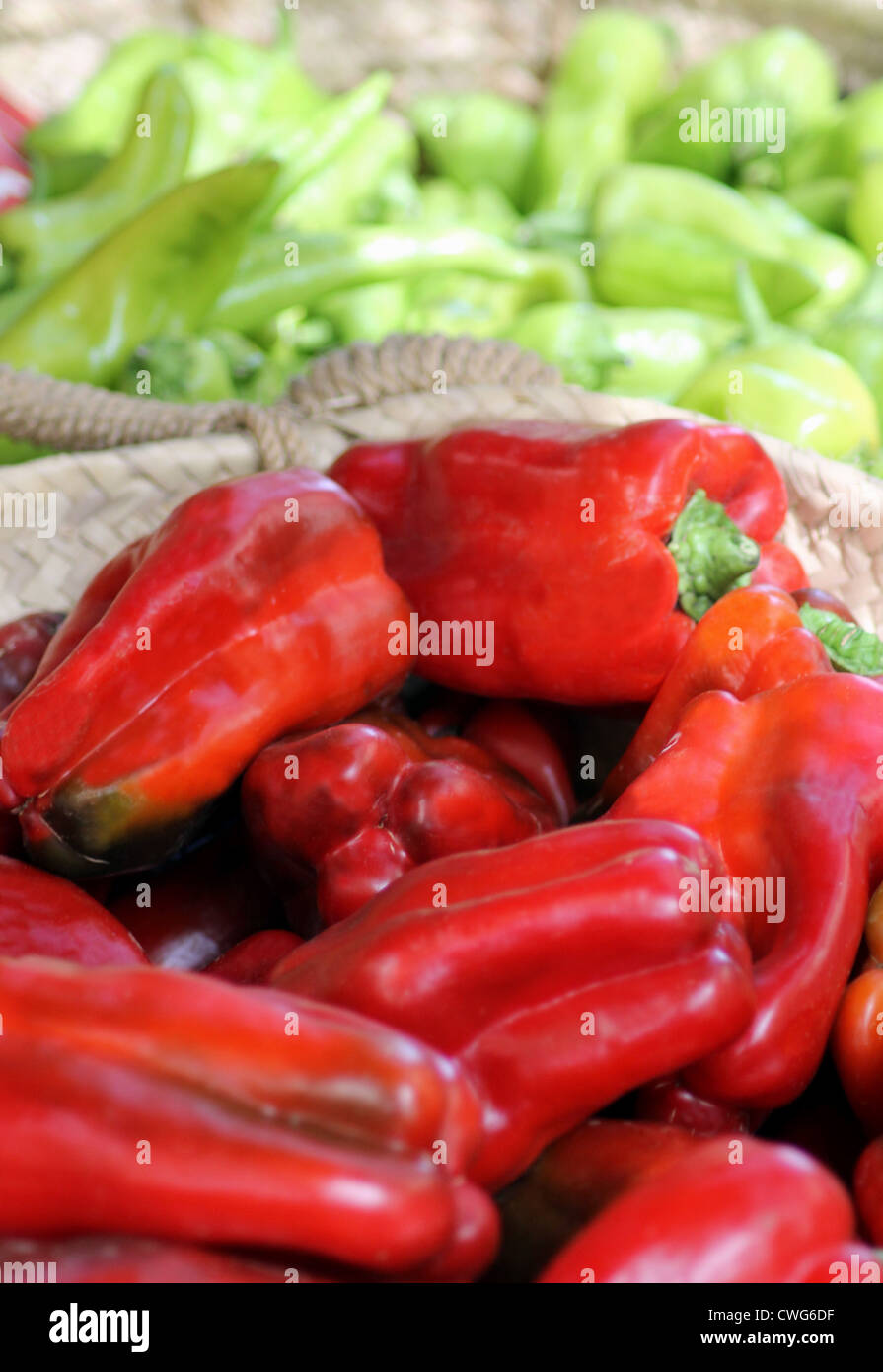 Baskets of ripe red and green bell peppers Stock Photo - Alamy