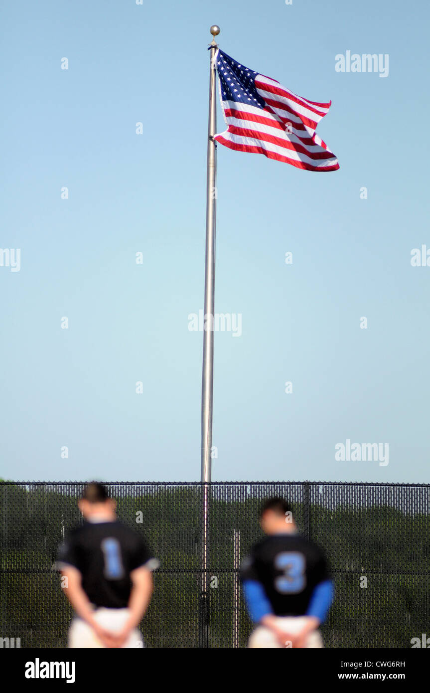 The U.S. flag unfurls in the evening breeze on Flag Day during the Atlanta  Braves and