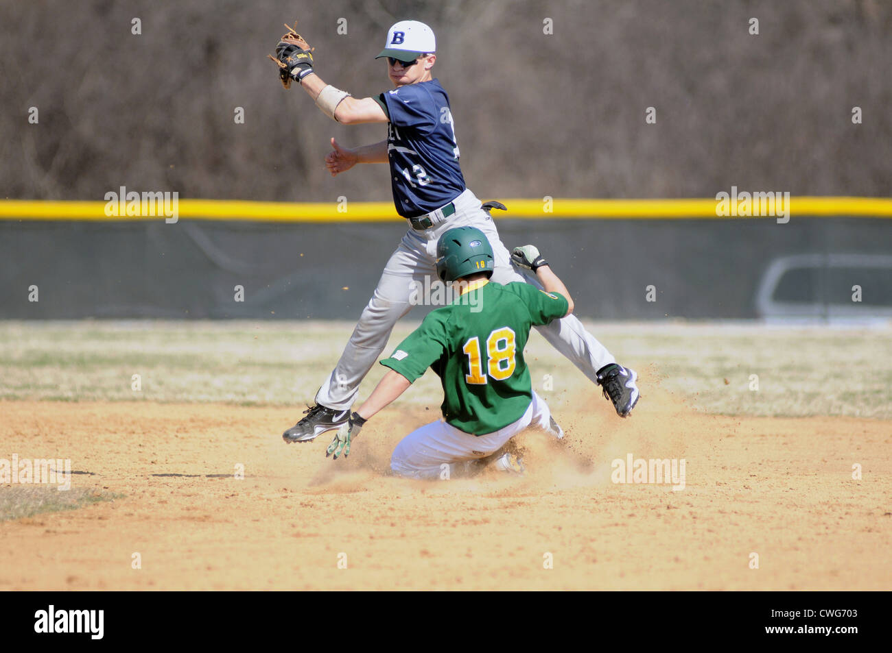 Baseball Middle infielder snags a throw and makes a swipe tag during a