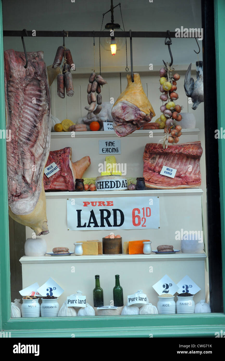 Old style butchers shop with pre decimal prices at Blists Hill Museum. Stock Photo
