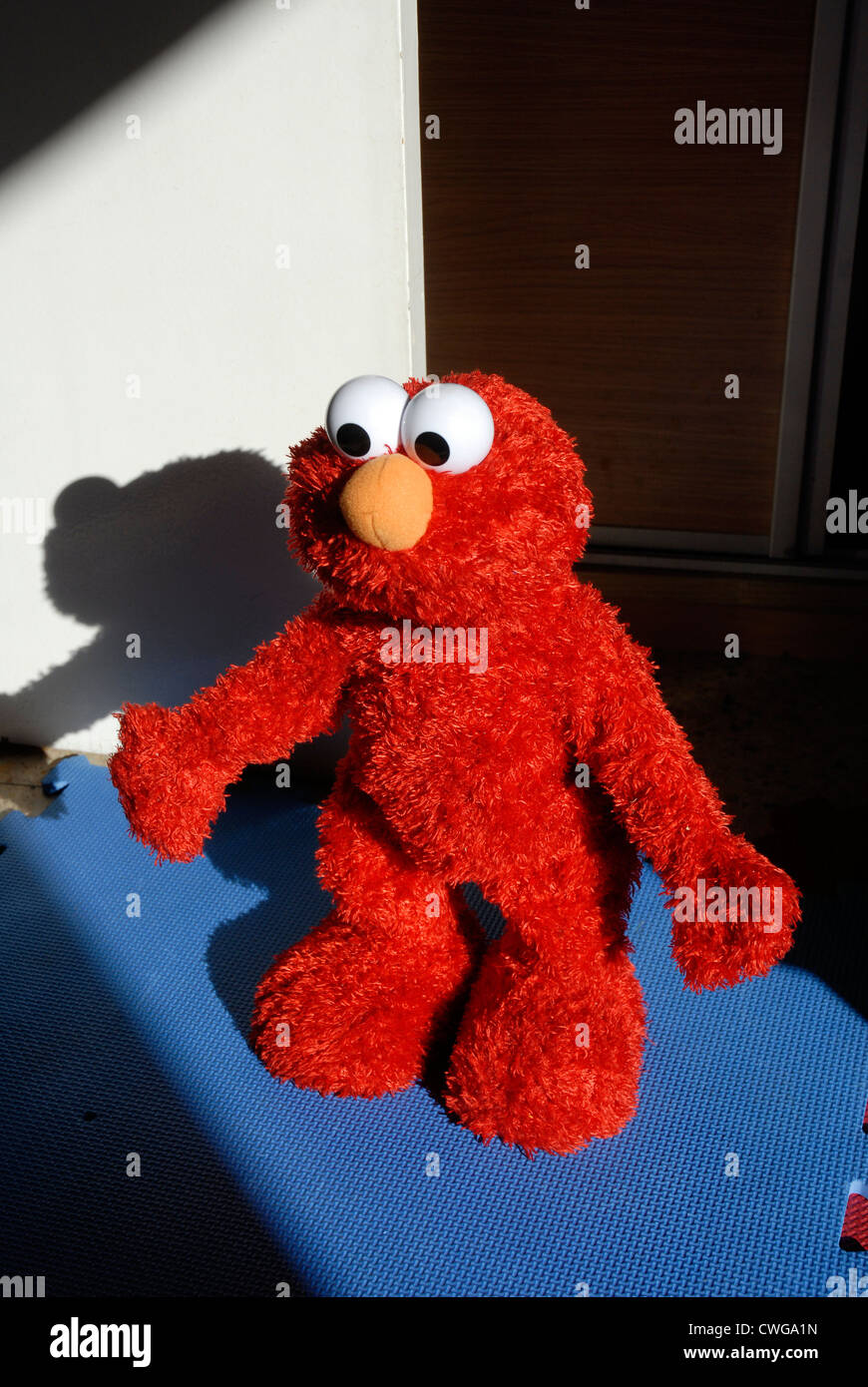 Elmo is a puppet of the television program Sesame Street Stock Photo