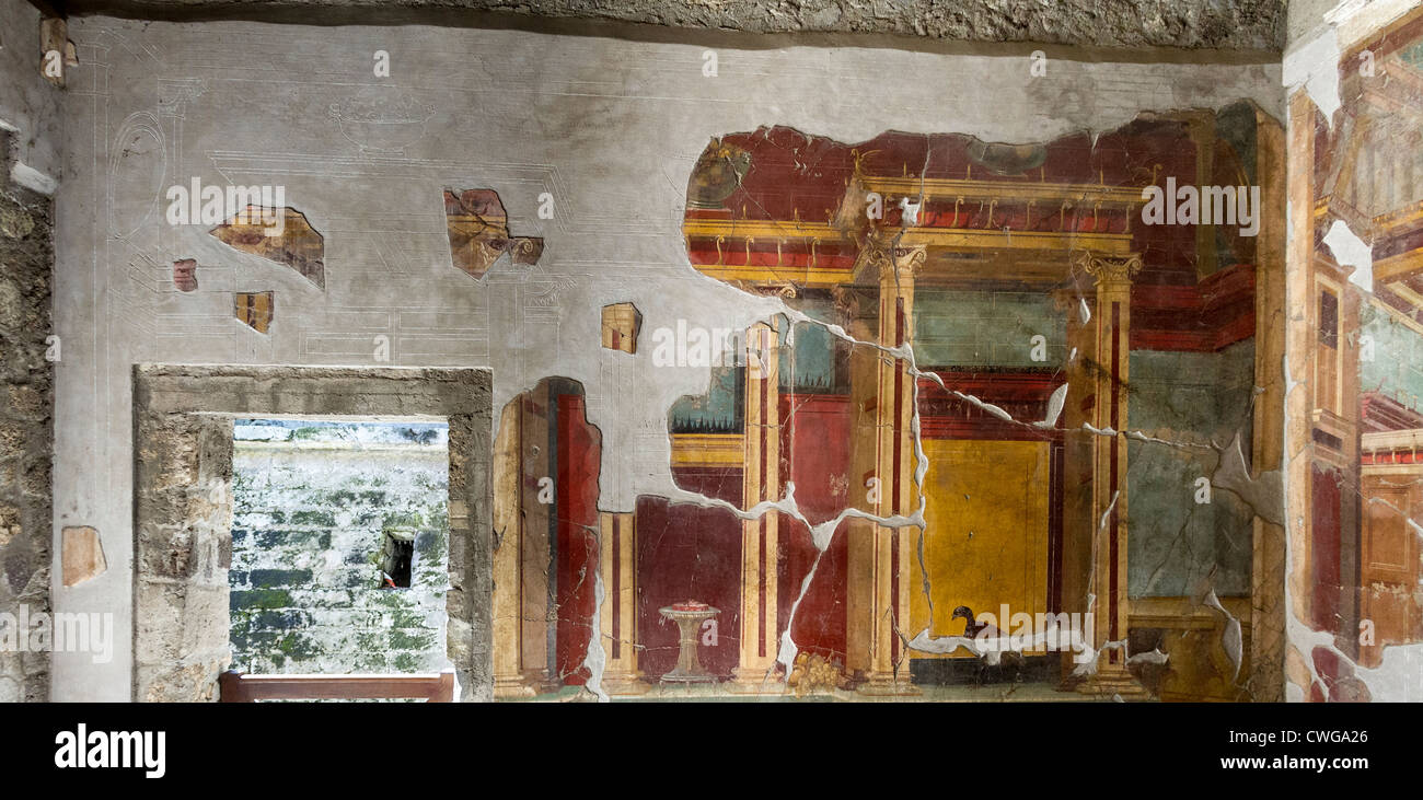 Frescos at the Villa di Poppaea at the Roman site of Oplontis, an aristocratic resort, depicting cakes, fruit bowls, birds. Stock Photo