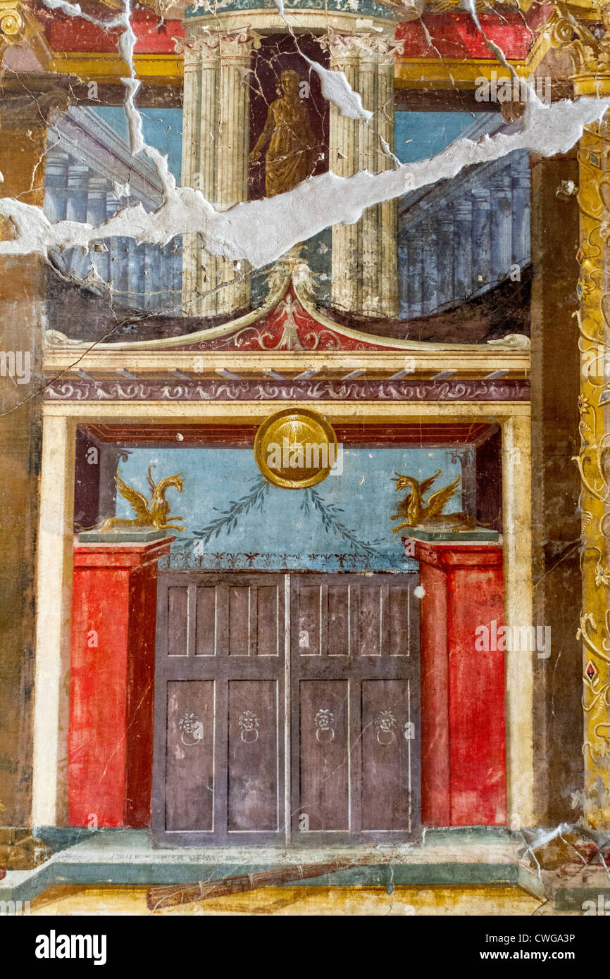 Frescos at the Villa di Poppaea at the Roman site of Oplontis, a resort, depicting gates and columns in perspective. Stock Photo