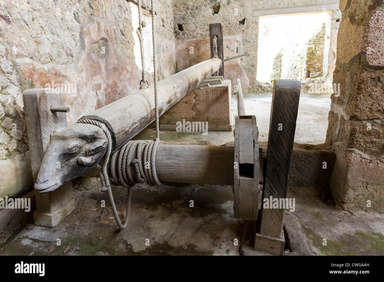 Reconstructed ancient Roman wine press carved in the form of a ram's