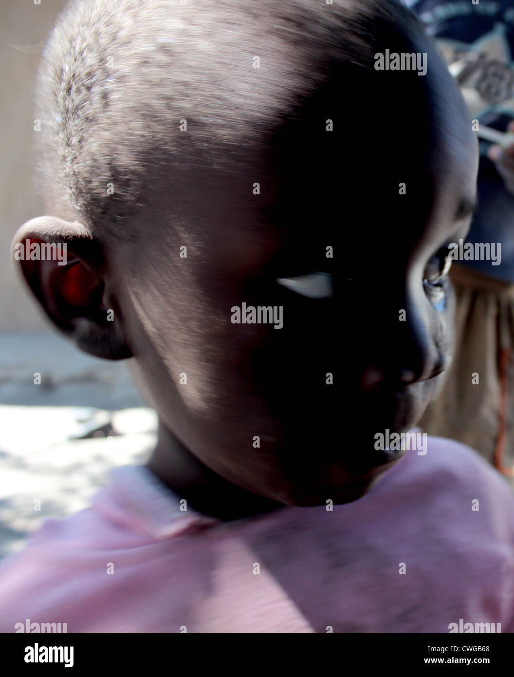A Zambian child crying,  Mwandi, Zambia near Livingstone. Stock Photo