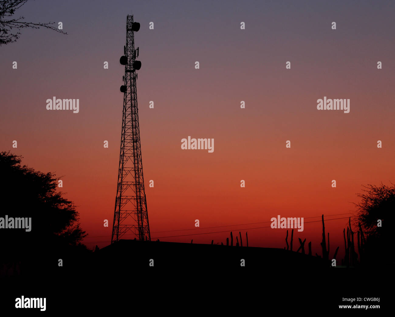 Telecommunications mast at sunset in Zambia, Africa Stock Photo