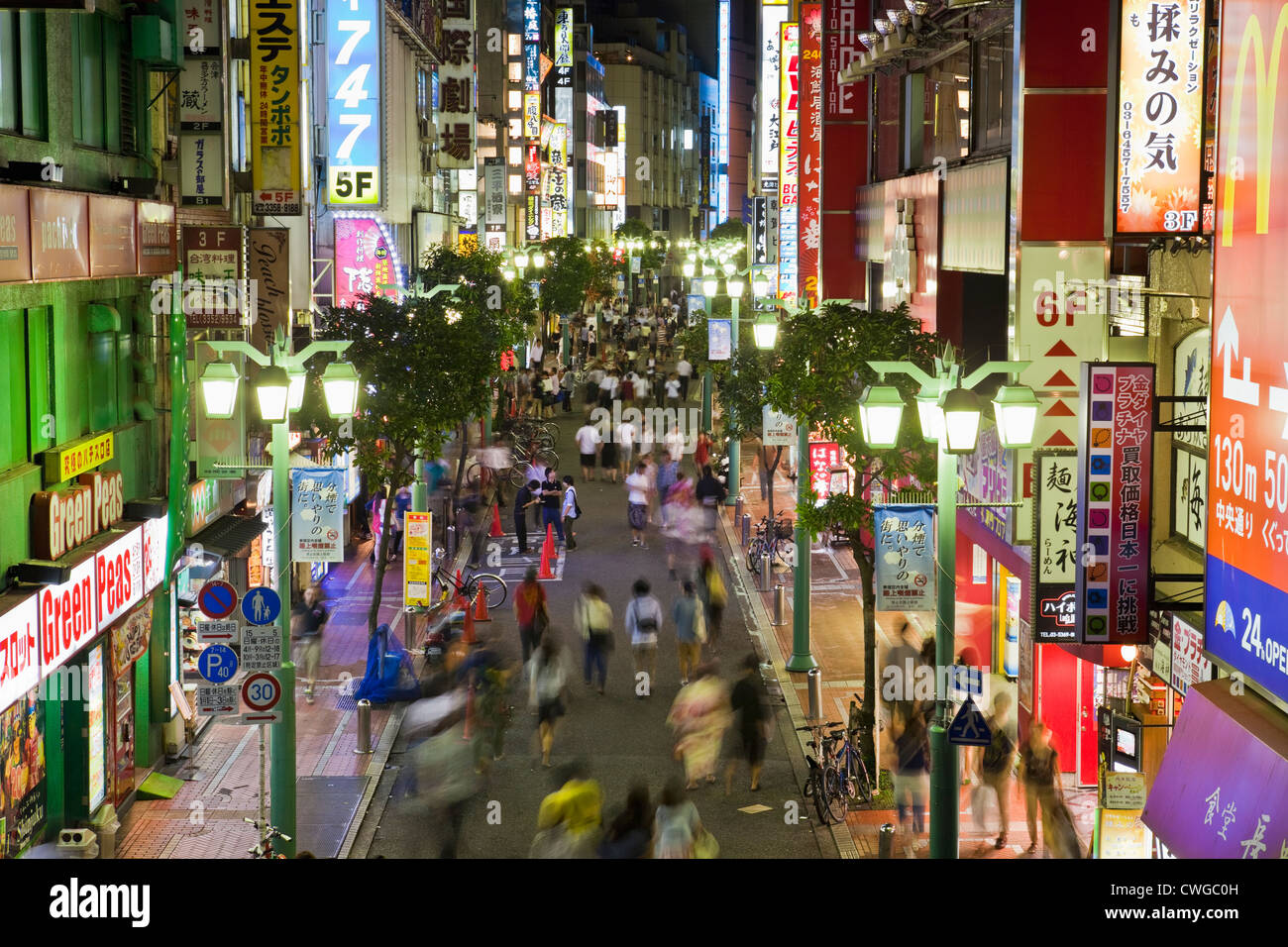 Shinjuku Street Scene at Night, Tokyo, Japan Stock Photo
