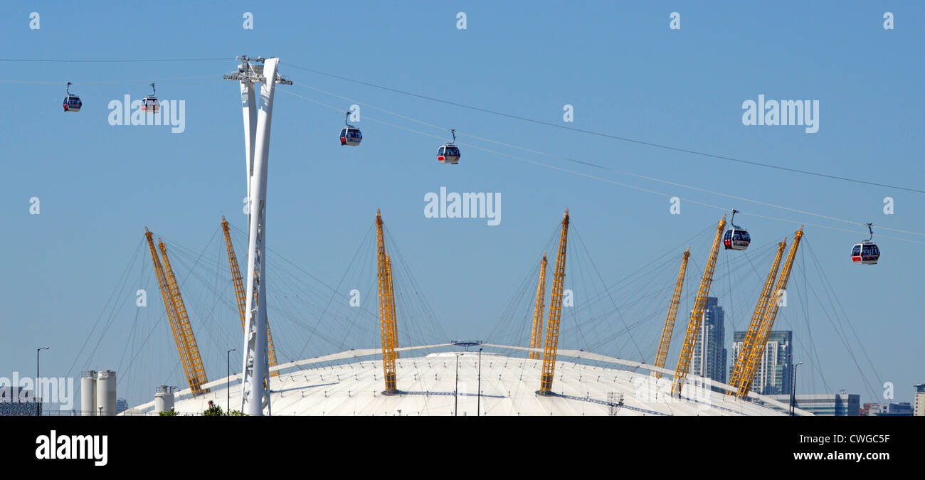Emirates Air Line cable cars seen in front of The o2 dome at The Royal Docks on crossing River Emirates Air Line cable cars seen in front of The o2 dome at The Royal Docks on crossing River