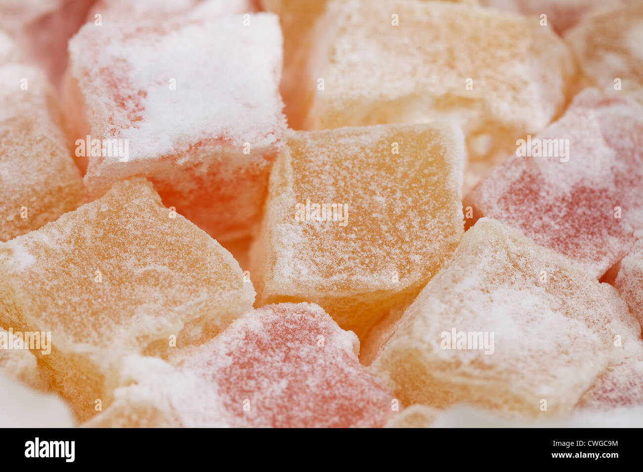 turkish sweet delight, rose and yellow, dusted with caster sugar Stock