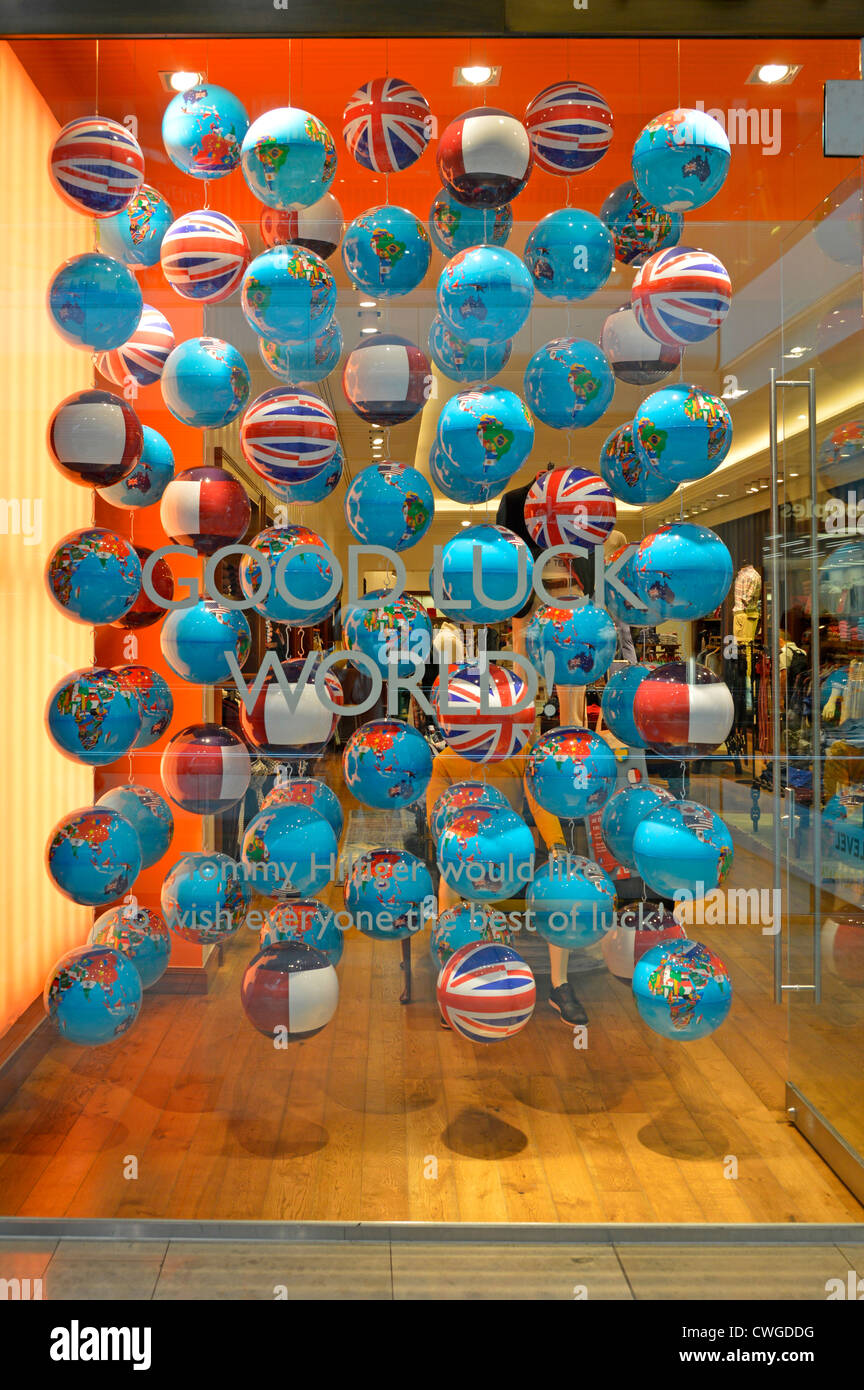 Globe map & flag spheres in shop window during London 2012 Olympics including Union flag versions Westfield shopping centre Stratford City London UK Stock Photo