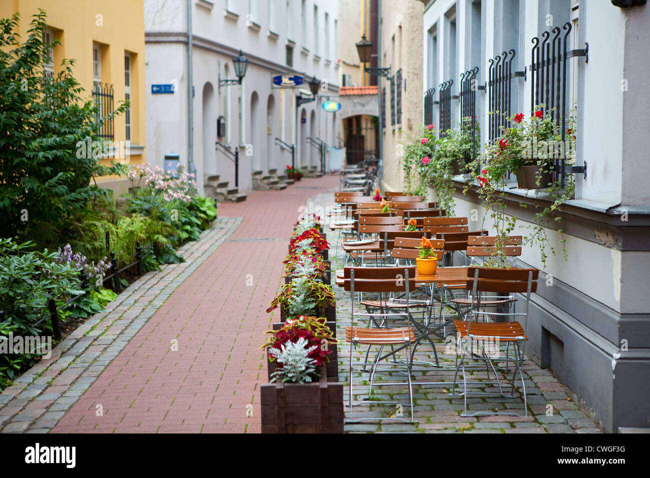 Latvia, the old town of Riga, a little street cafe Stock Photo