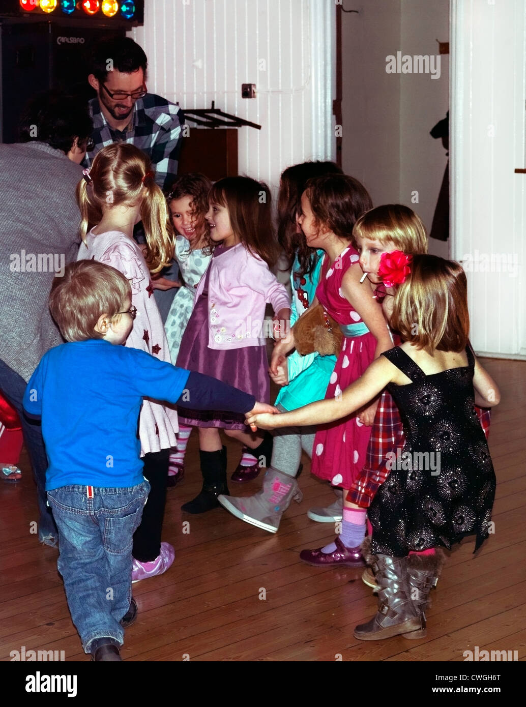 Children Dancing With Parents At A Disco Doing Hokey Cokey At A Fifth