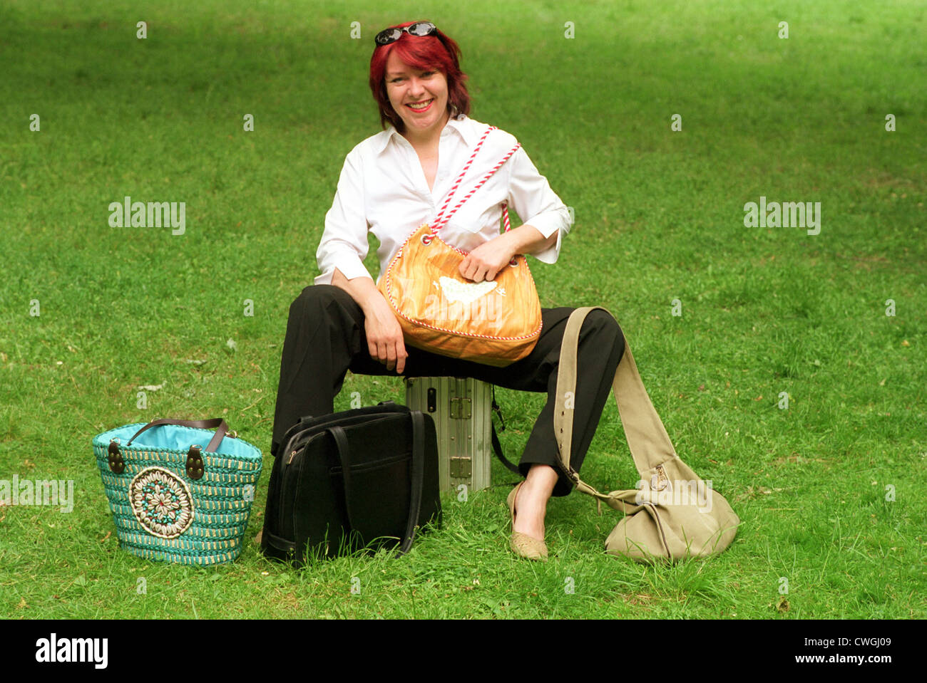 Berlin woman with many handbags Stock Photo