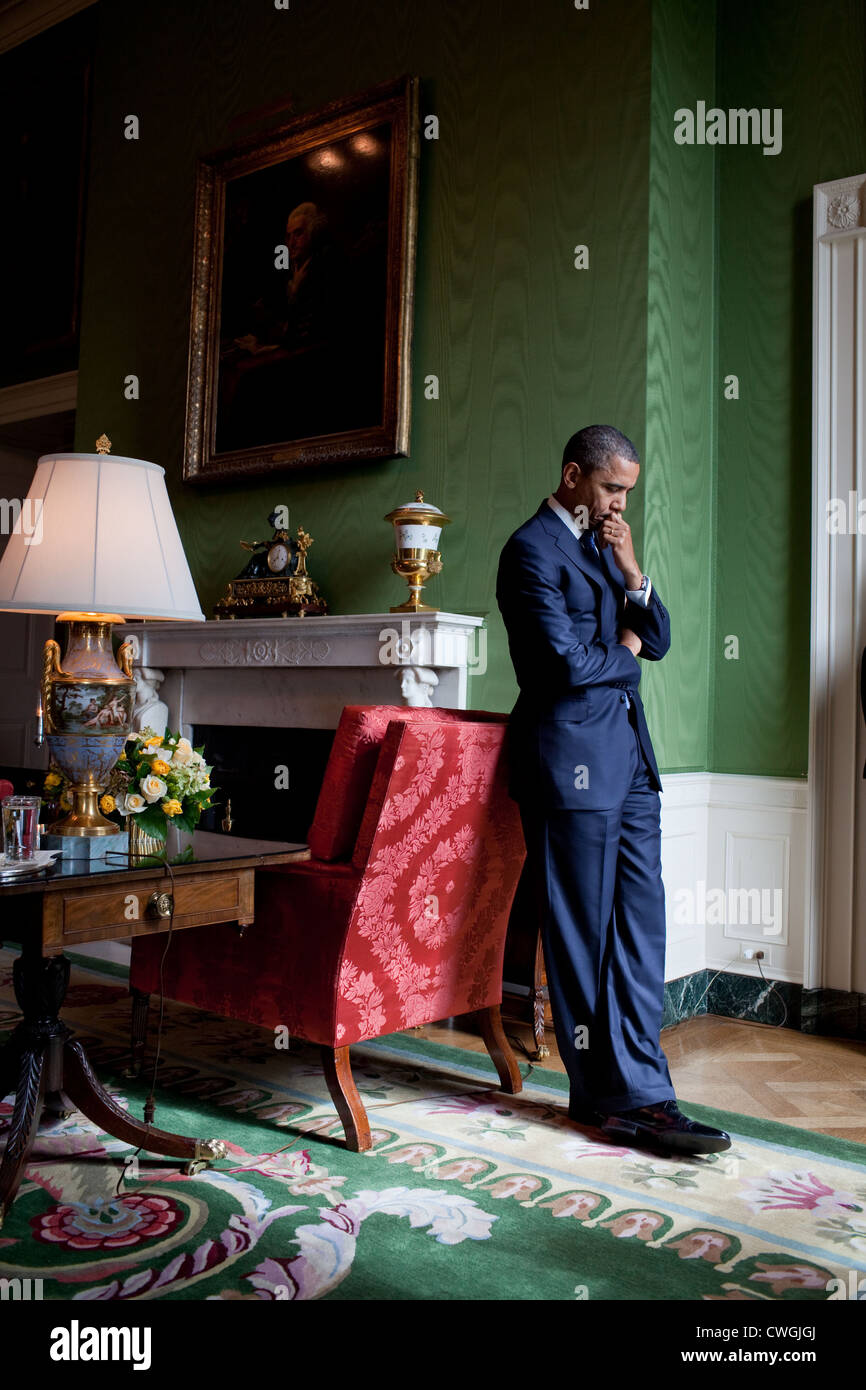 President Barack Obama stands alone in the Green Room before speaking at the White House Summit on Community Colleges, Oct. 5, 2 Stock Photo