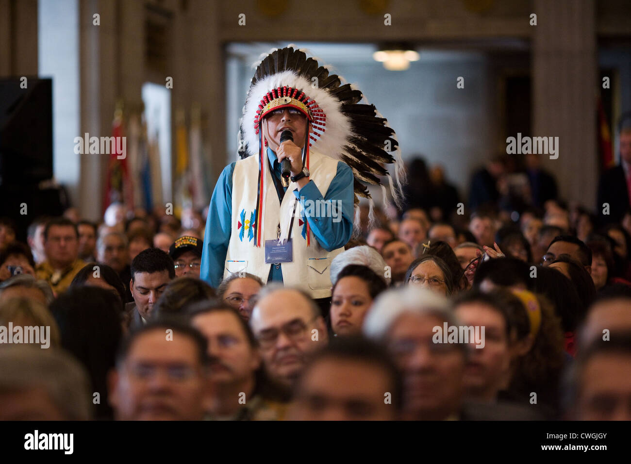 Tribal leader Marcus Levings asks President Obama a question at the White House Tribal Nations Conference at the U.S. Department Stock Photo