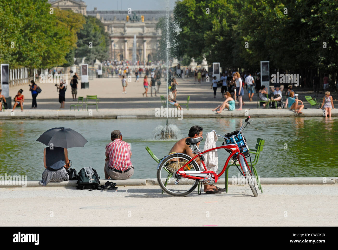 Paris, France. Jardin des Tuileries. People relaxing on very hot day Stock Photo