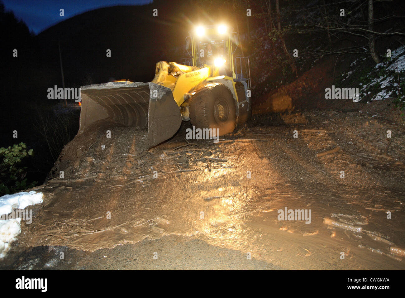 Trabzon, excavator clears the road after a landslide Stock Photo