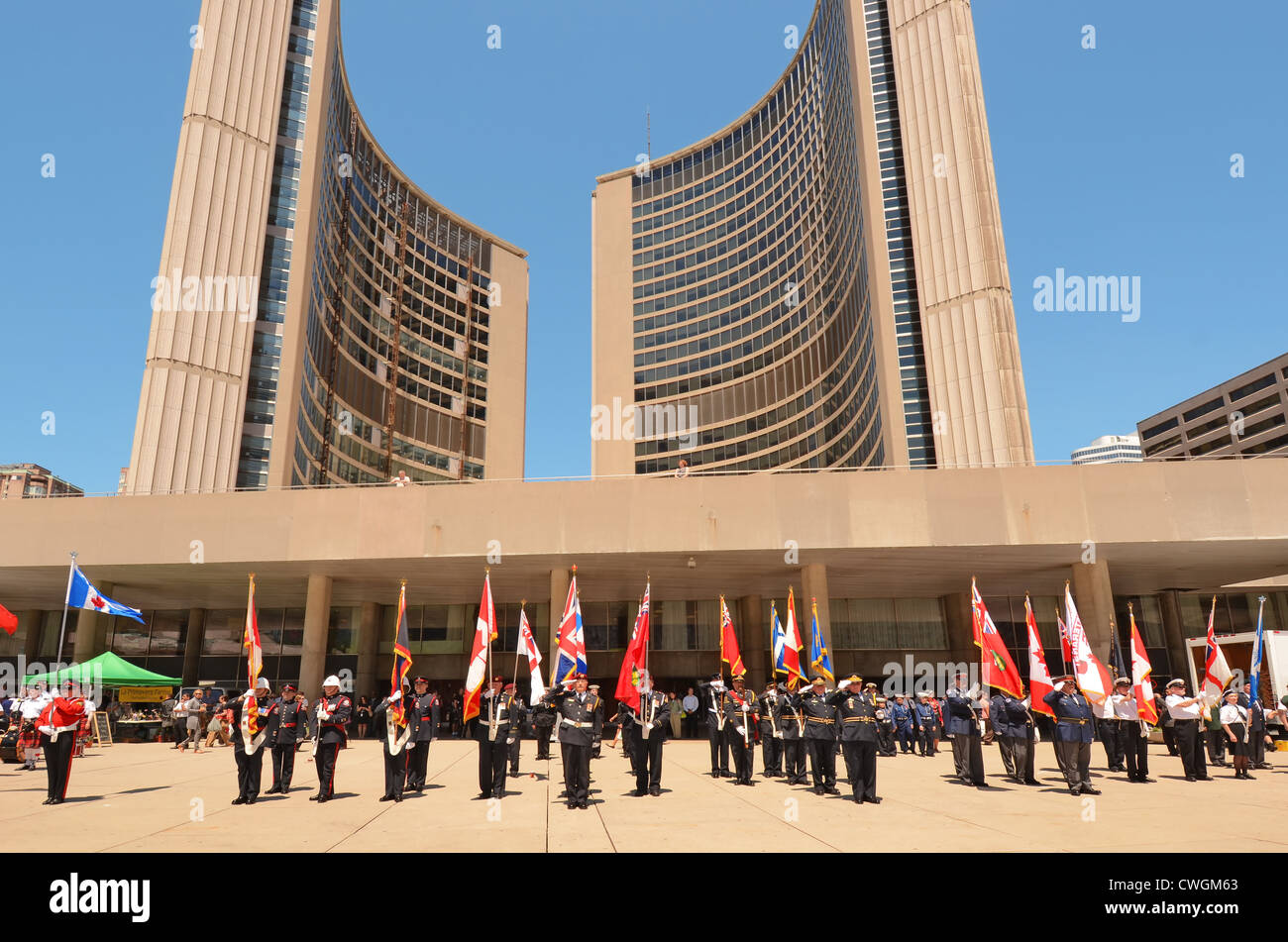 Canadian armed Forces parading beneath The City Hall, Toronto, Canada, celebrating 72nd. Anniversary of the Battle of Dunkirk Stock Photo