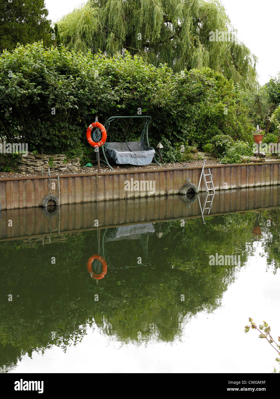 Private riverside rest area and mooring on river Cam Cambridgeshire Stock Photo