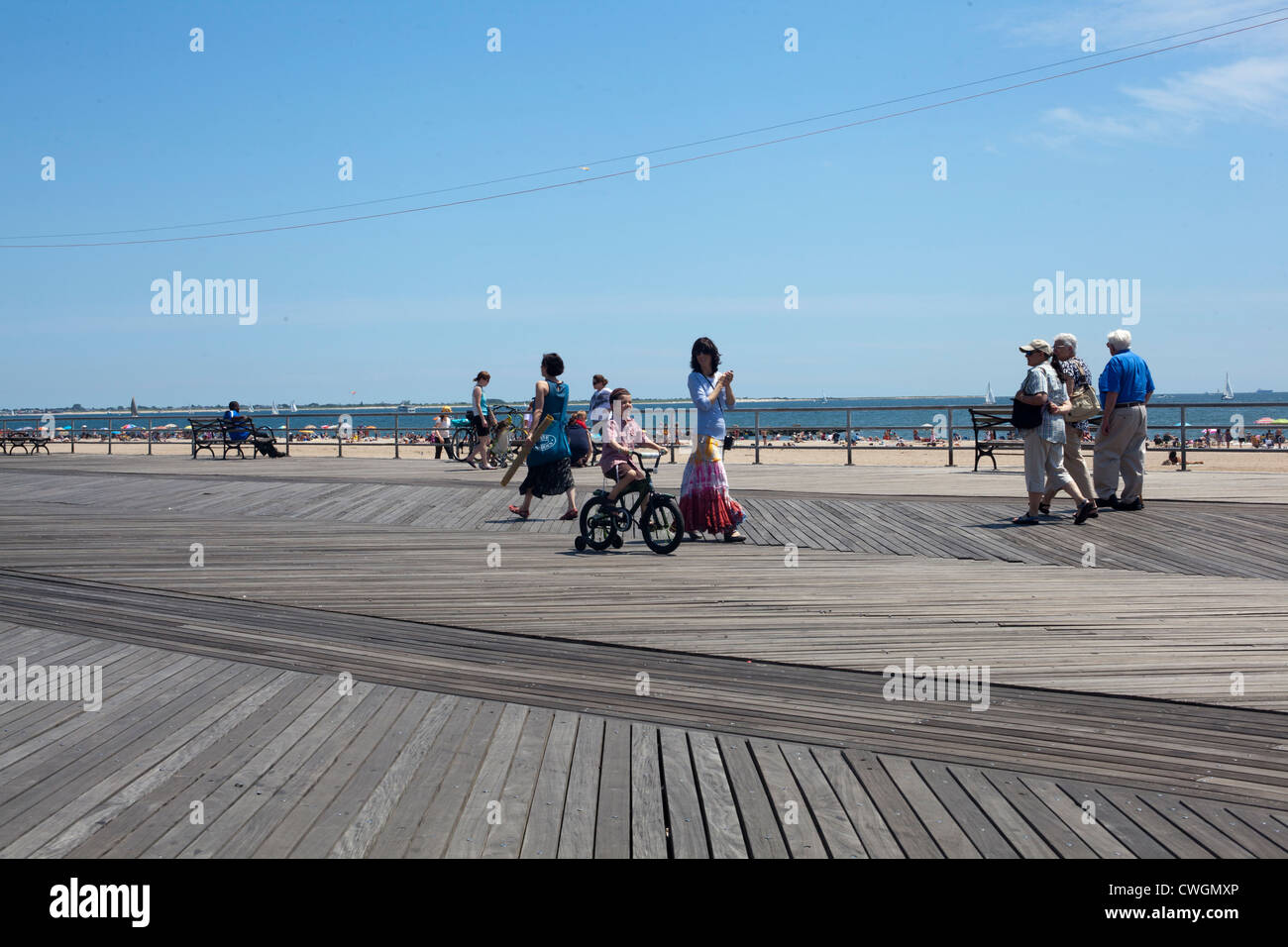 People enjoy the summer sun at Coney Island Stock Photo