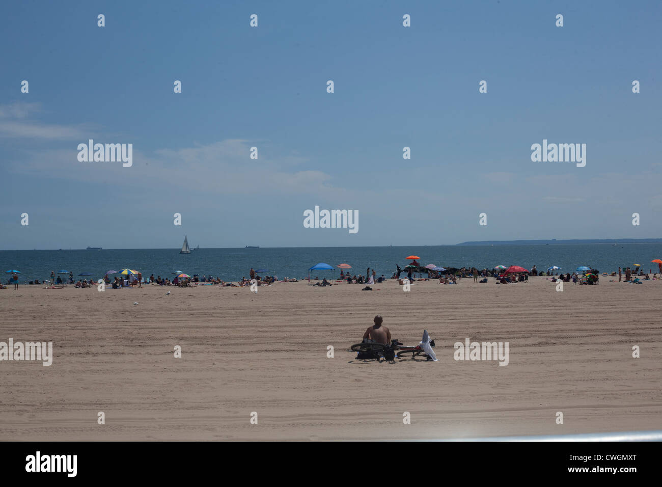 People enjoy the summer sun at Coney Island Stock Photo
