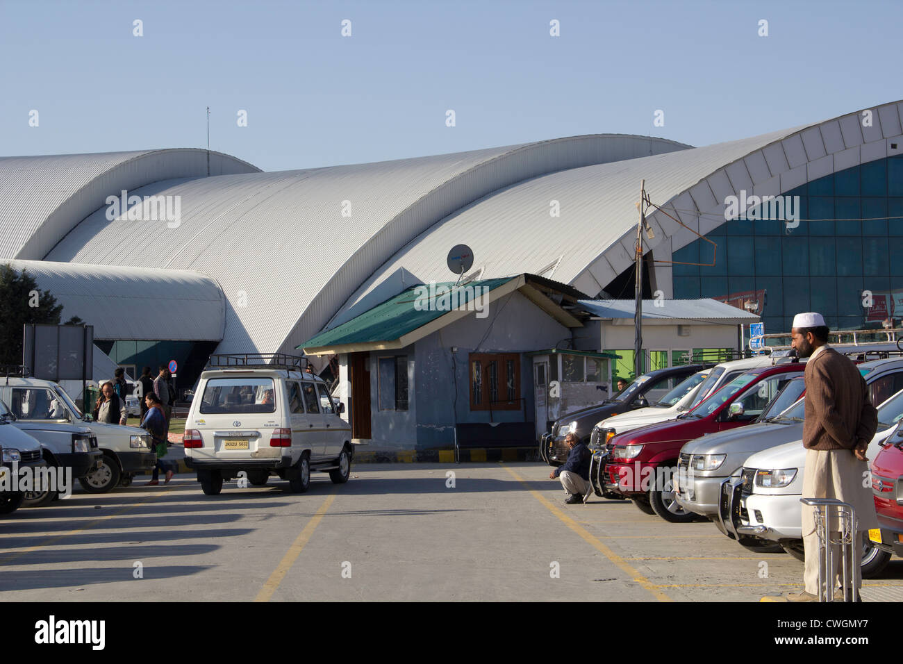 Taxis lined up outside the Srinagar airport in India. This is a high security area due to the history of terrorism in Kashmir. Stock Photo