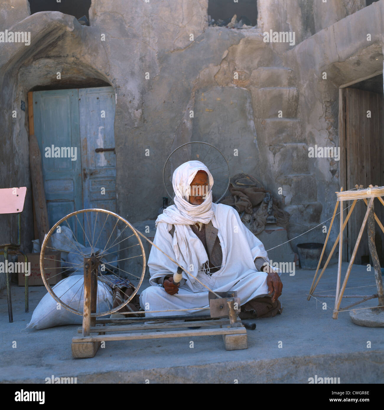 Medenine Tunisia Man Spinning Fibre With Old Bicycle Wheel Stock Photo