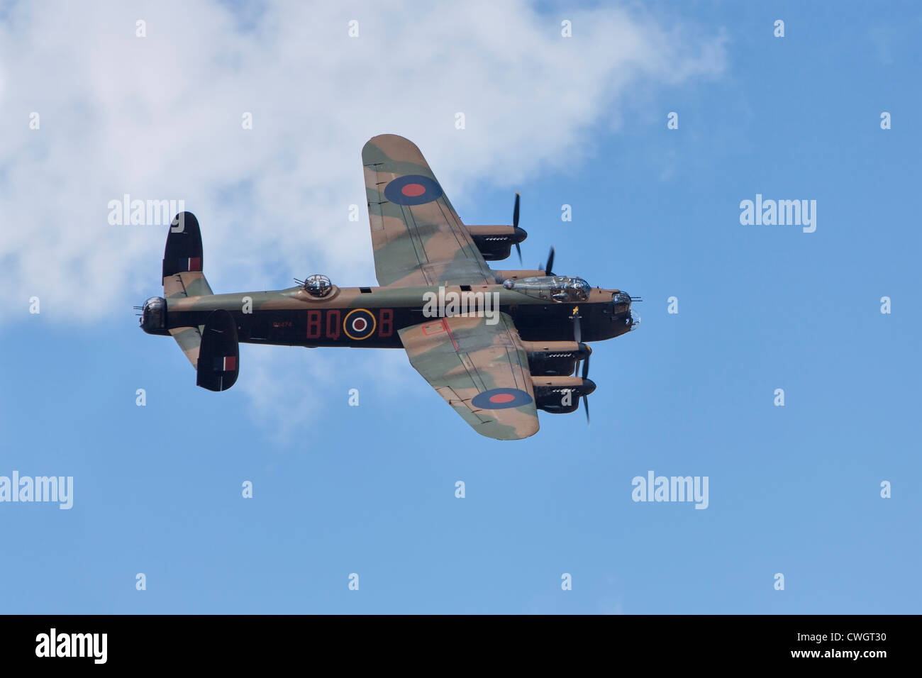 Avro Lancaster bomber of the Battle of Britain Memorial Flight, over-flying Little Gransden airfield. Stock Photo